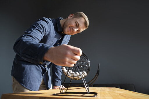 a man hoping to win a lottery gambling in & Near Bronx